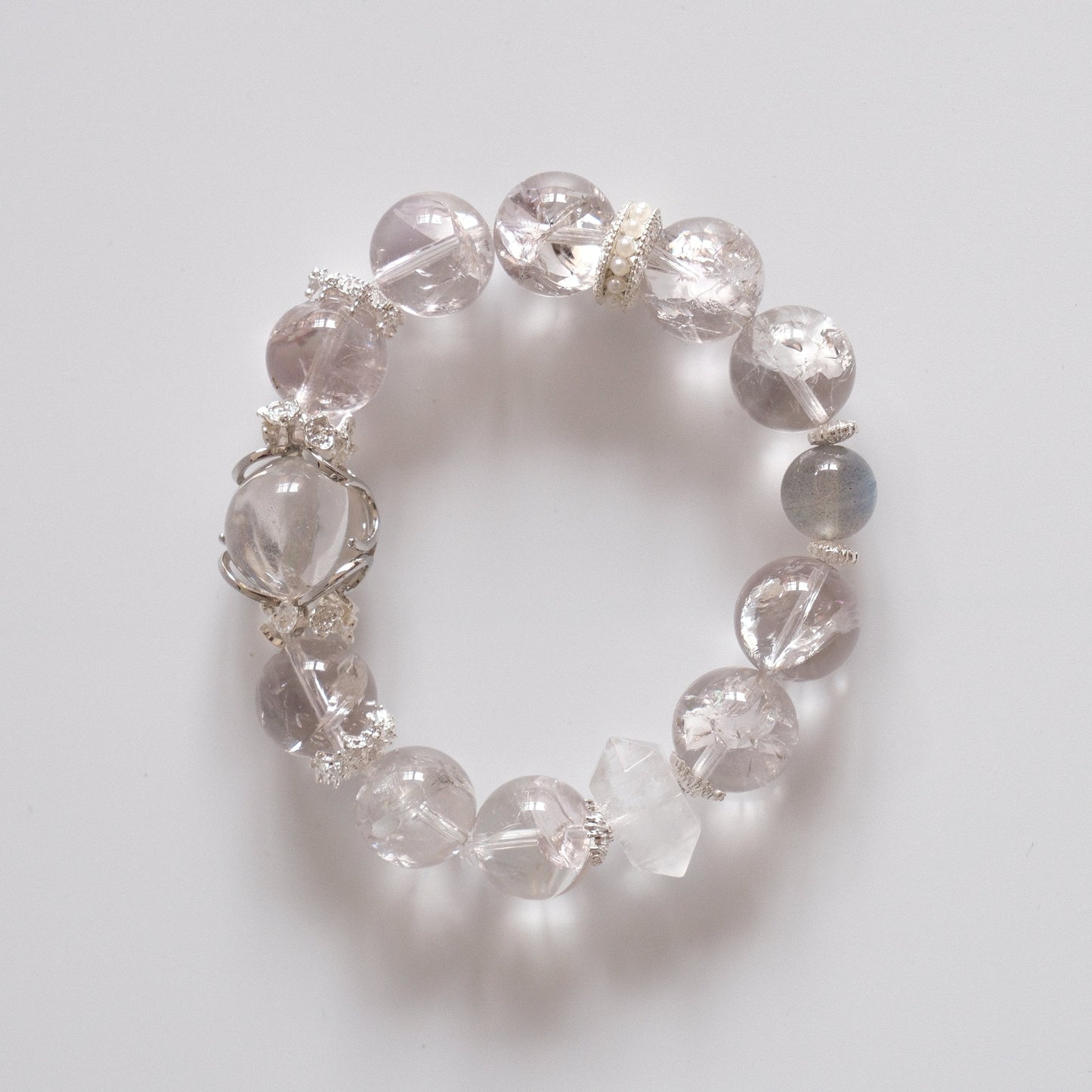 "Silverveil Light bracelet with clear quartz and pearl details"