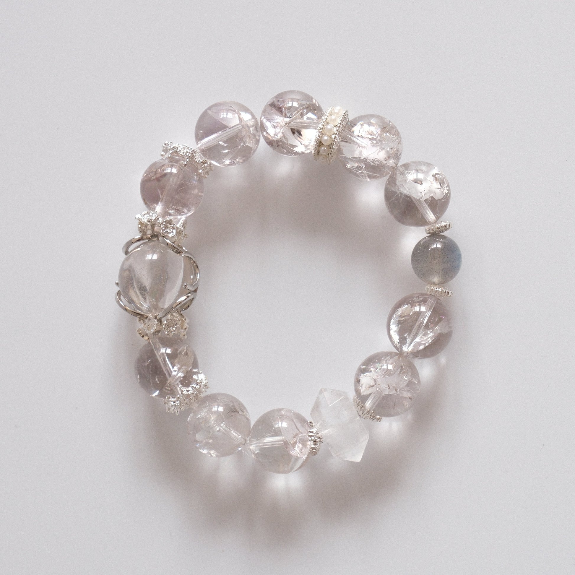 "Silverveil Light bracelet with clear quartz and pearl details"